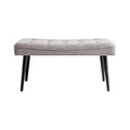 **Pouf contemporain en tissu avec pieds en bois noir**