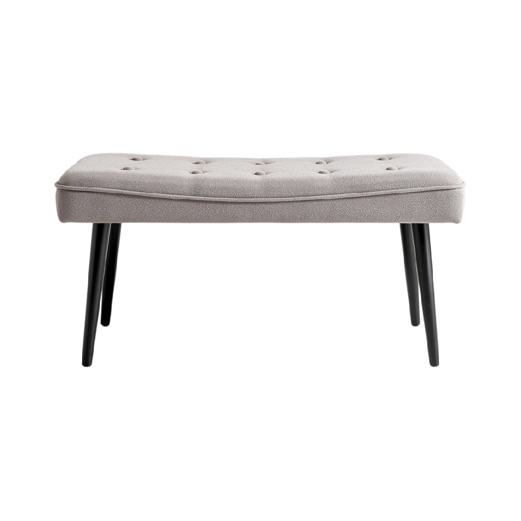 **Pouf contemporain en tissu avec pieds en bois noir**